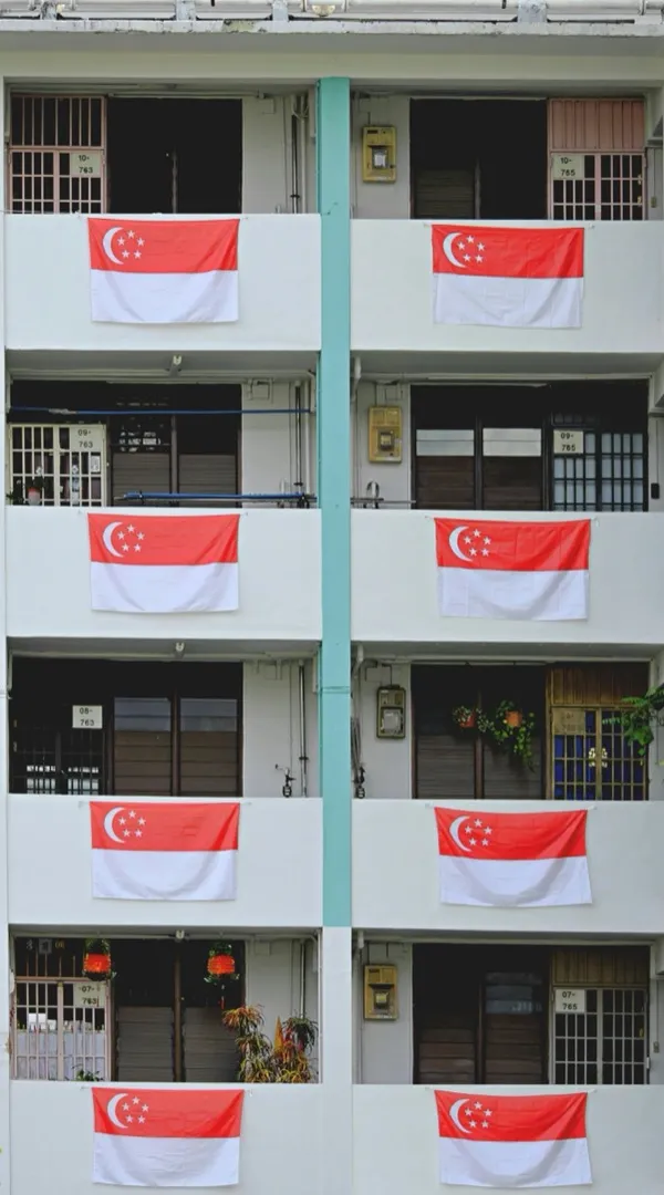 Singapore public housing block with national flags